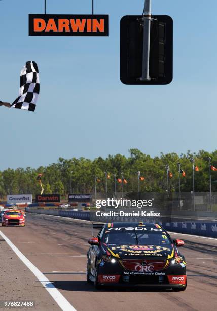 David Reynolds drives the Erebus Penrite Racing Holden Commodore ZB takes the chequered flag to win race 16 for the Supercars Darwin Triple Crown at...