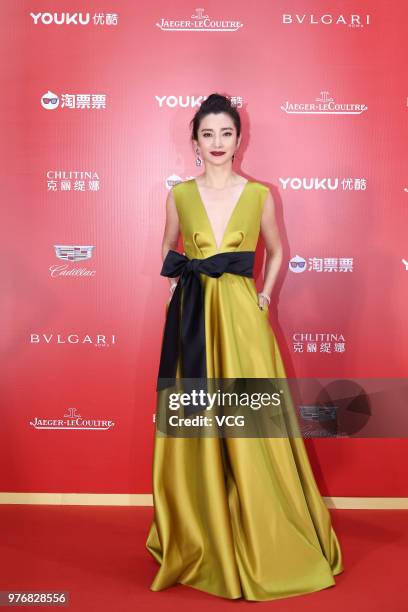 Actress Li Bingbing arrives at red carpet during the opening ceremony of the 21st Shanghai International Film Festival at Shanghai Grand Theatre on...