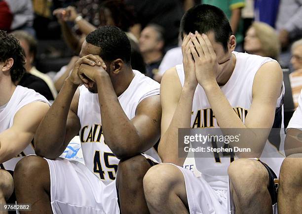 Max Zhang and Markhuri Sanders-Frison of the California Golden Bears react late in the game with the Washington Huskies during the championship game...