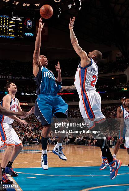 Shawn Marion of the Dallas Mavericks puts up the floater against Wilson Chandler of the New York Knicks during a game at the American Airlines Center...