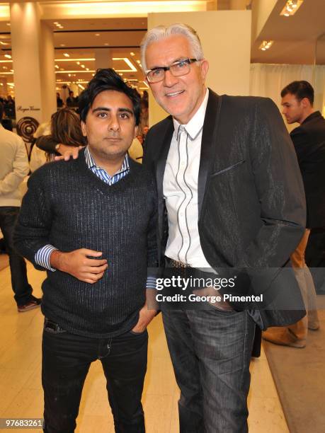 Shinan Govani and Elmer Olsen attend Miss J. Alexander's celebrity walk-off event and book signing at Holt Renfrew Bloor Street on March 13, 2010 in...