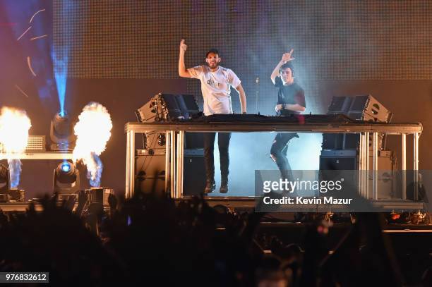 San Holo and Martin Garrix perform on the Backyard Stage during the 2018 Firefly Music Festival on June 16, 2018 in Dover, Delaware.