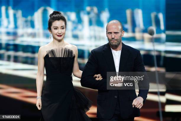 English actor Jason Statham and Chinese actress Li Bingbing attend the opening ceremony of the 21st Shanghai International Film Festival at Shanghai...