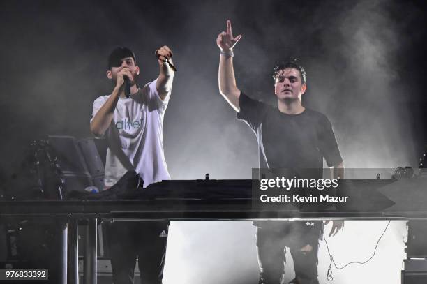 San Holo and Martin Garrix perform on the Backyard Stage during the 2018 Firefly Music Festival on June 16, 2018 in Dover, Delaware.