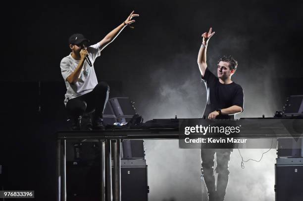 San Holo and Martin Garrix perform on the Backyard Stage during the 2018 Firefly Music Festival on June 16, 2018 in Dover, Delaware.