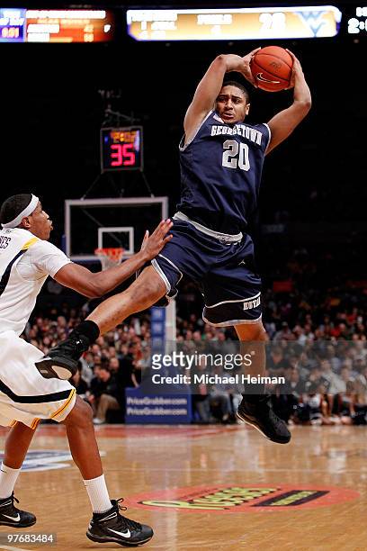 Jerrelle Benimon of the Georgetown Hoyas catches the inbounds pass against Kevin Jones of the West Virginia Mountaineers during the championship of...