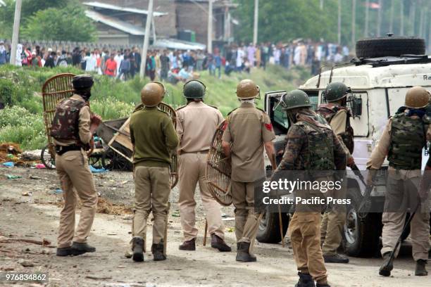 Security forces stand alert during the violent protest. Massive clashes erupted between protesters and government forces after Eid prayers on the eve...