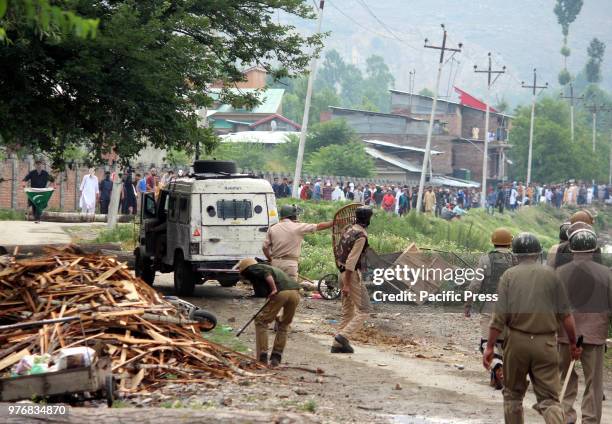 Security forces stand alert during the violent protest. Massive clashes erupted between protesters and government forces after Eid prayers on the eve...