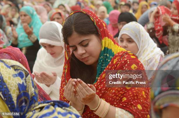 Large number of Pakistani faithful Muslims offer Eid al-Fitr prayers to celebrate the end of the holy month of Ramadan, at a historical Badshahi...