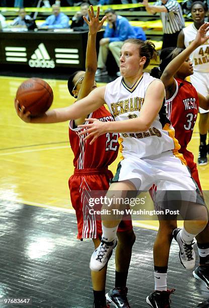 Seneca Valley's Kelsey Wolfe goes to the basket pass Western's Raiya Mc Knight in the 3A championship game at UMBC's RAC Arena on March 13, 2010 in...