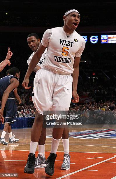 Kevin Jones of the West Virginia Mountaineers celebrates after a play late in the game against the Georgetown Hoyas during the championship of the...