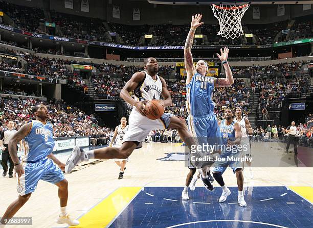 Sam Young of the Memphis Grizzlies shoots against Chris Andersen of the Denver Nuggets on March 13, 2010 at FedExForum in Memphis, Tennessee. NOTE TO...