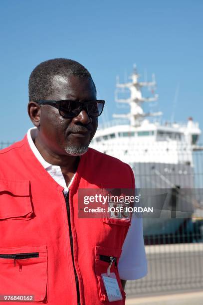 Secretary General of the International Federation of Red Cross and Red Crescent Societies Elhadj As Sy poses in front of the Italian coast guard boat...