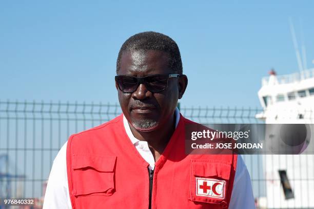 Secretary General of the International Federation of Red Cross and Red Crescent Societies Elhadj As Sy poses in front of the Italian coast guard boat...