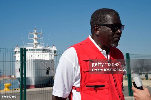 Secretary General of the International Federation of Red Cross and Red Crescent Societies Elhadj As Sy poses in front of the Italian coast guard boat...