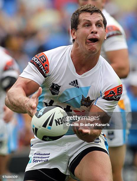 Greg Bird of the Titans passes the ball during the round one NRL match between the Gold Coast Titans and the Warriors at Skilled Park on March 14,...