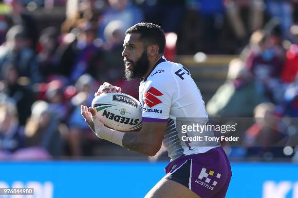 Josh Addo-Carr of the Storm in action during the round 15 NRL match between the Newcastle Knights and the Melbourne Storm at McDonald Jones Stadium...
