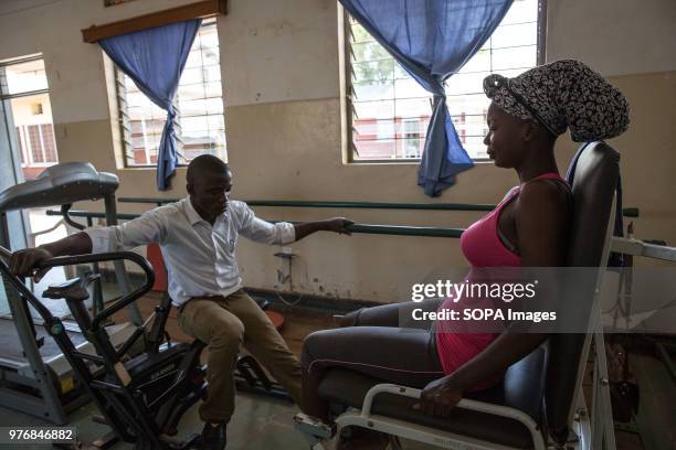 Members of the medics team. Medics create prosthetics for some of the thousands of Ugandan land mine victims, who have come to Gulu Hospital,...