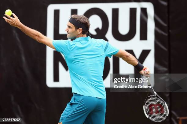 Roger Federer of Switzerland serves the ball to Mischa Zverev of Germany during day 3 of the Mercedes Cup at Tennisclub Weissenhof on June 13, 2018...