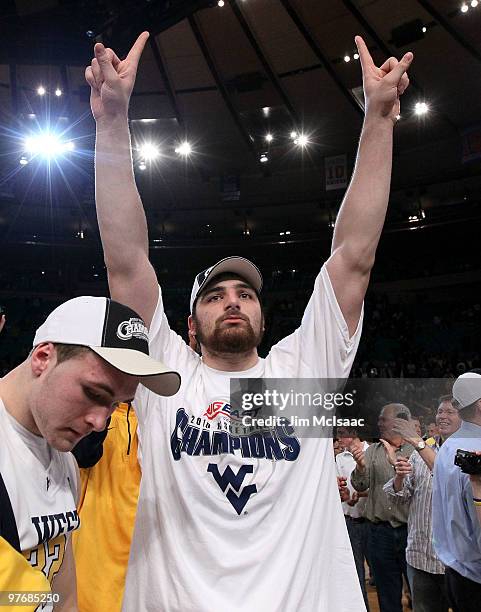 Deniz Kilicli of the West Virginia Mountaineers celebreates after defeating the Georgetown Hoyas during the championship of the 2010 NCAA Big East...