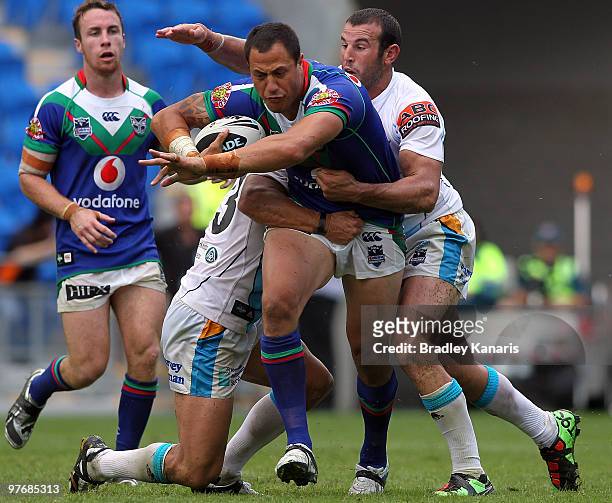 Jesse Royal of the Warriors takes on the defence during the round one NRL match between the Gold Coast Titans and the Warriors at Skilled Park on...