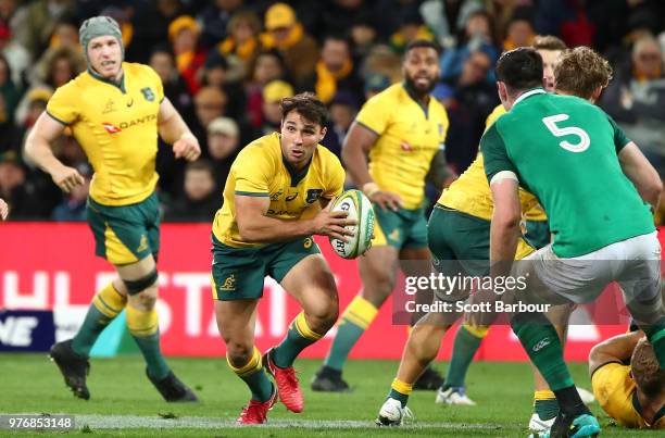 Nick Phipps of the Wallabies runs with the ball during the International test match between the Australian Wallabies and Ireland at AAMI Park on June...