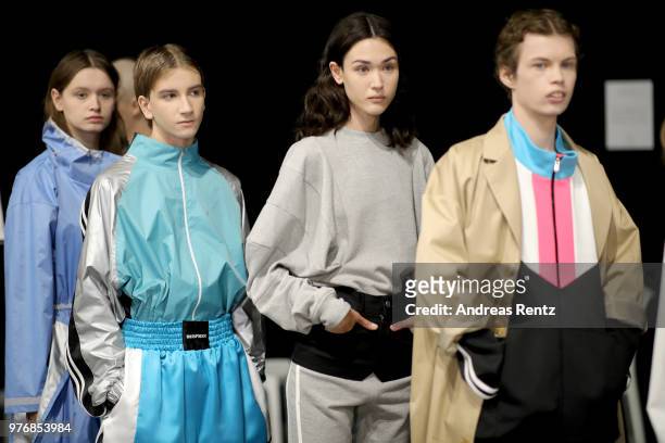 Models are seen backstage ahead of the Besfxxk show during Milan Men's Fashion Week Spring/Summer 2019 on June 17, 2018 in Milan, Italy.
