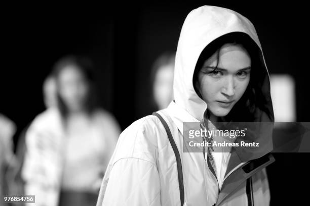 Model is seen backstage ahead of the Besfxxk show during Milan Men's Fashion Week Spring/Summer 2019 on June 17, 2018 in Milan, Italy.