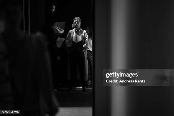 Models are seen backstage ahead of the Besfxxk show during Milan Men's Fashion Week Spring/Summer 2019 on June 17, 2018 in Milan, Italy.