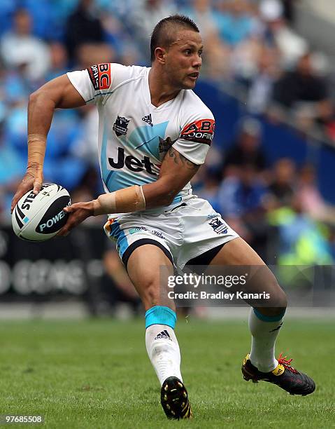 Scott Prince of the Titans passes the ball during the round one NRL match between the Gold Coast Titans and the Warriors at Skilled Park on March 14,...