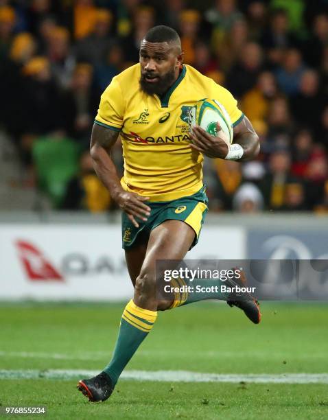 Marika Koroibete of the Wallabies runs with the ball during the International test match between the Australian Wallabies and Ireland at AAMI Park on...
