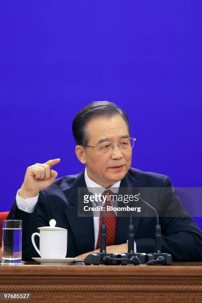 Wen Jiabao, China's premier, speaks at a news conference following the close of the National People's Congress in Beijing, China, on Sunday, March...
