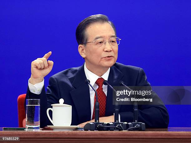 Wen Jiabao, China's premier, speaks at a news conference following the close of the National People's Congress in Beijing, China, on Sunday, March...