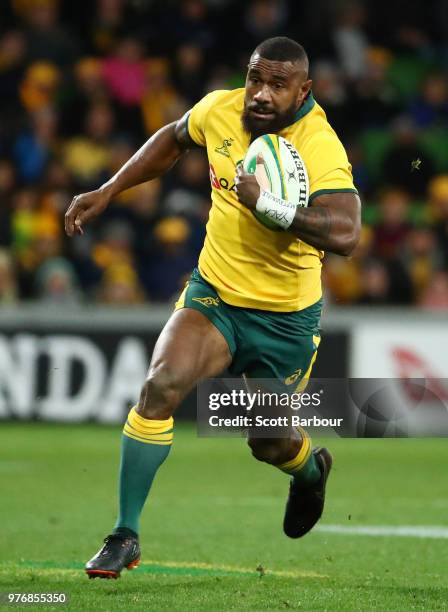 Marika Koroibete of the Wallabies runs with the ball during the International test match between the Australian Wallabies and Ireland at AAMI Park on...