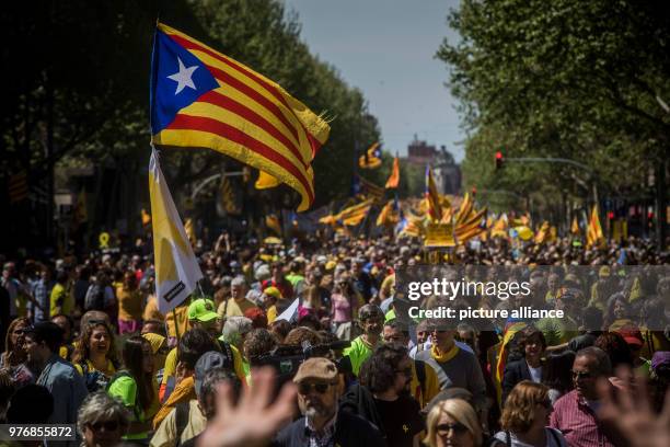 April 2018, Spain, Barcelona: Supporters of Catalonia's independence participate in a demonstration supporting arrested Catalan politicians. Numerous...