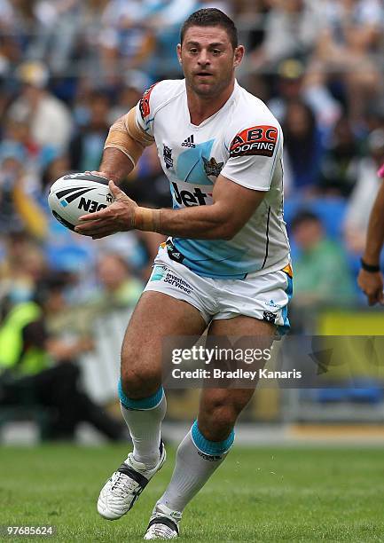 Mark Minichiello of the Titans runs with the ball during the round one NRL match between the Gold Coast Titans and the Warriors at Skilled Park on...