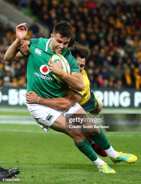 Conor Murray of Ireland is tackled by Nick Phipps of the Wallabies during the International test match between the Australian Wallabies and Ireland...