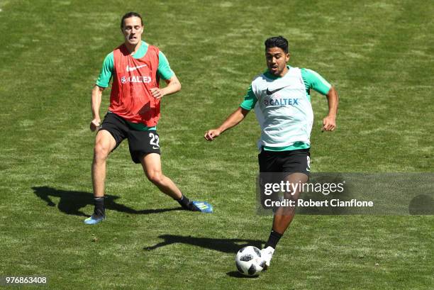 Massimo Lungo and Jackson Irvine of Australia train during an Australia Socceroos training session at Stadium Trudovye Rezervy on June 17, 2018 in...