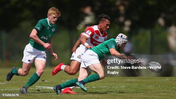 Michael Lowry of Ireland dives on a loose ball during the World Rugby via Getty Images Under 20 Championship 11th Place play-off match between...