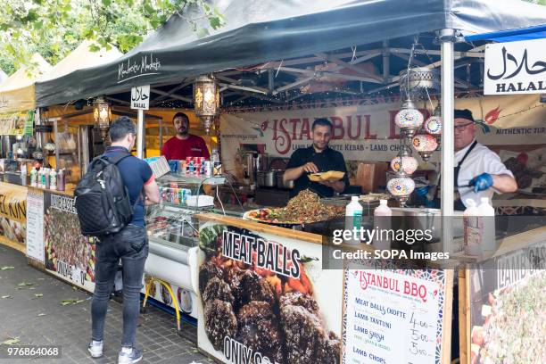 Meat balls stand in the city. Greater Manchester is a remarkable city in the northwest of England with a lush industrial heritage. The Castle field...