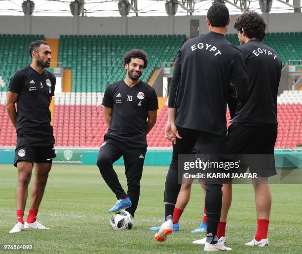 Egypt's forward Mohamed Salah and Egypt's defender Ahmed Elmohamady attend a training session during the Russia 2018 World Cup football tournament at...