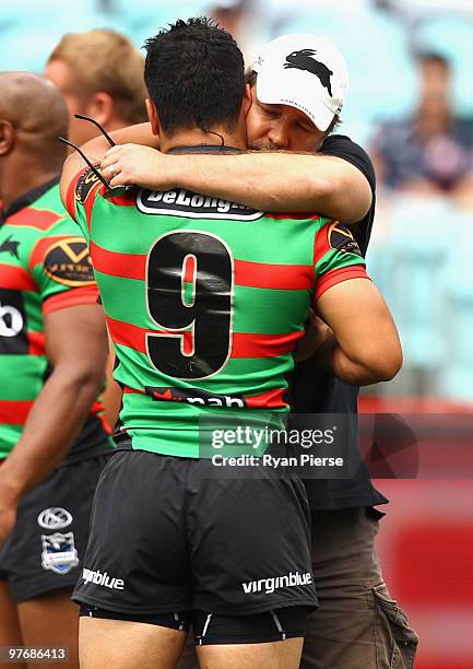 Russell Crowe hugs Issac Luke of the Rabbitohs before the round one NRL match between the South Sydney Rabbitohs and the Sydney Roosters at ANZ...