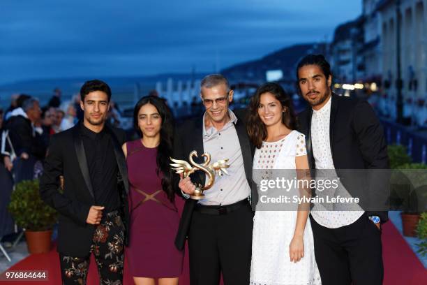 Winner of the best Film Award Abdellatif Kechiche and Shaïn Boumedine, Hafsia Herzi, Ophelie Bau and boyfriend attend the winners' red carpet of...