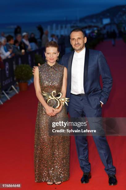 Winner of the Best Actress Award Melanie Thierry and Safy Nebbou attend the winners' red carpet of Cabourg Film Festival on June 16, 2018 in Cabourg,...