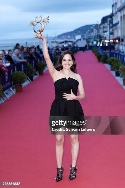 Winner of the Feminine Revelation Clemence Boisnard attends the winners' red carpet of Cabourg Film Festival on June 16, 2018 in Cabourg, France.