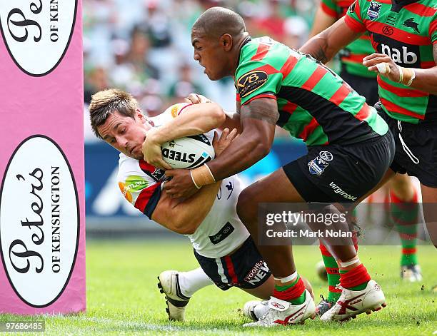 Mitchell Pearce of the Roosters heads for the try line during the round one NRL match between the South Sydney Rabbitohs and the Sydney Roosters at...