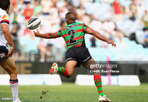 Nathan Merritt of the Rabbitohs drops the ball while running downfield during the round one NRL match between the South Sydney Rabbitohs and the...