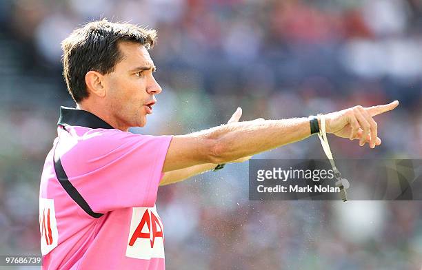 Referee Tony De Las Heras awards a penalty during the round one NRL match between the South Sydney Rabbitohs and the Sydney Roosters at ANZ Stadium...