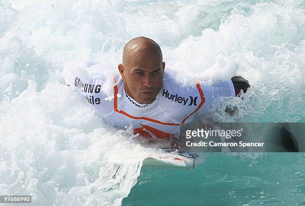 Kelly Slater of the United States rides a wave into shore during the Boost Bondi Beach SurfSho at Bondi Beach on March 14, 2010 in Sydney, Australia.