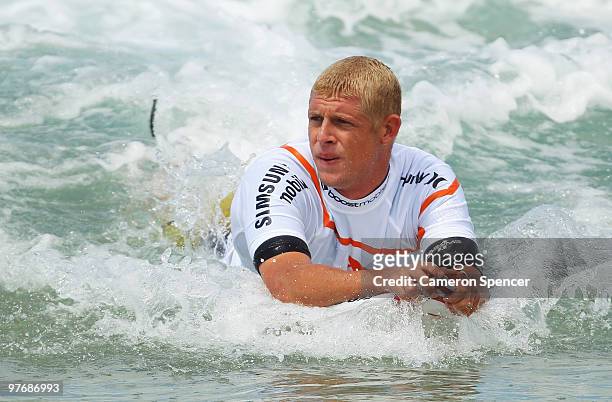 Mick Fanning of Australia rides a wave into shore during the Boost Bondi Beach SurfSho at Bondi Beach on March 14, 2010 in Sydney, Australia.